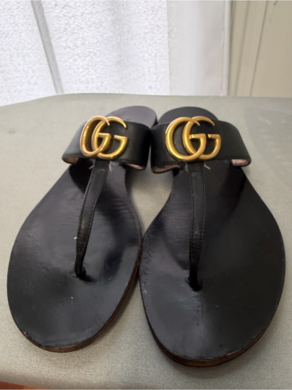 Gucci Black Leather Thong Sandals with Gold GG Hardware